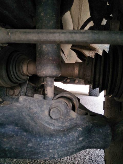 Front lower control arm and bush on a Toyota Hilux viewed from underneath